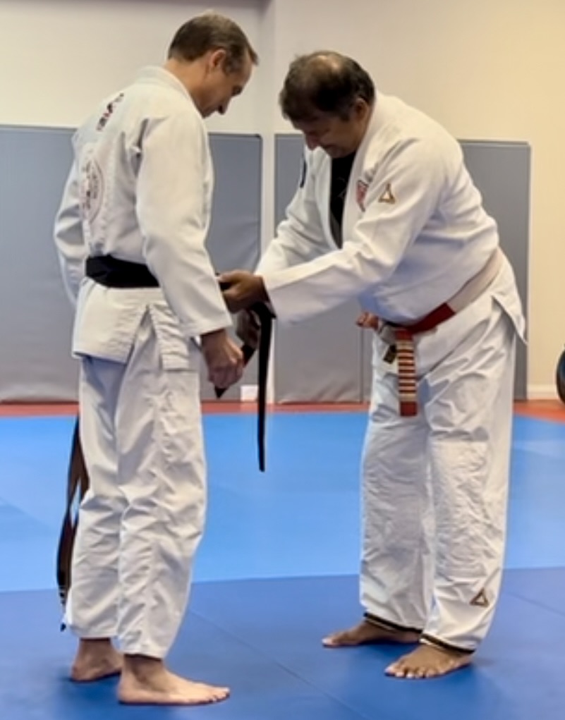 Tim's black belt promotion with Master Luiz Palhares